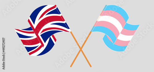 Crossed and waving flags of the UK and Transgender Pride