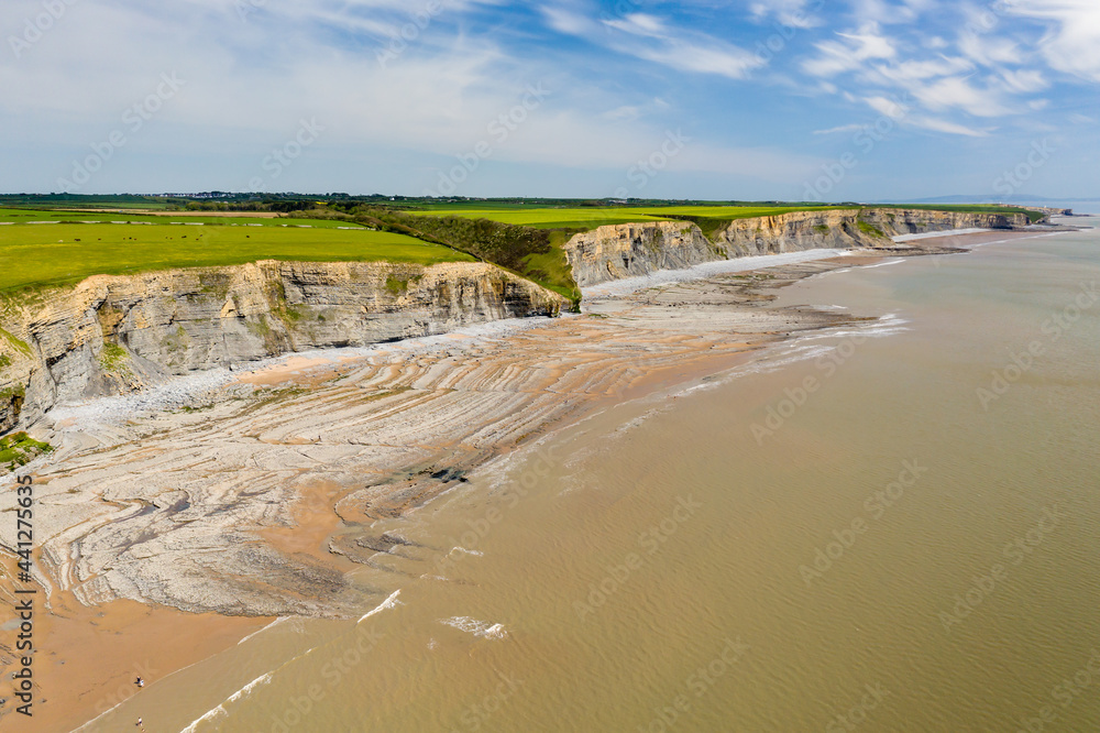 Aerial view of dramatic limestone cliffs and coastline at Southerndown, Wales Aerial view of dramatic limestone cliffs and coastline at Southerndown, Wales