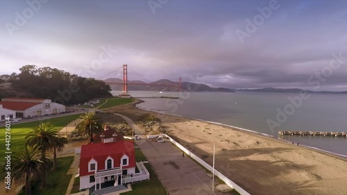 Aerial: Crissy Field flying out to Golden Gate Bridge photo