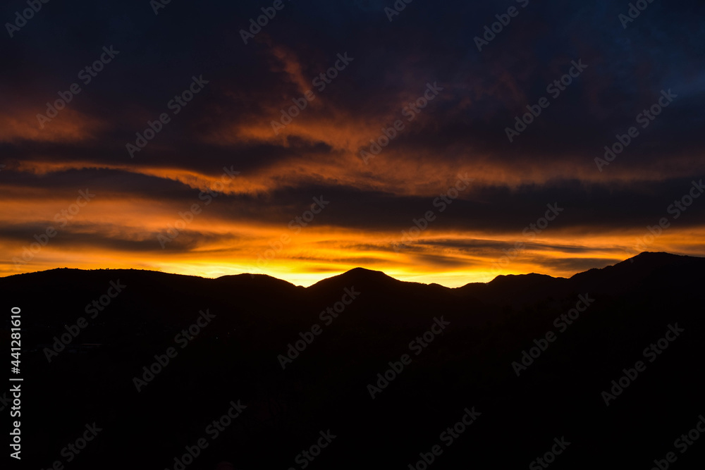 Coppery sunset between the mountains of Autlan de Navarro Jalisco