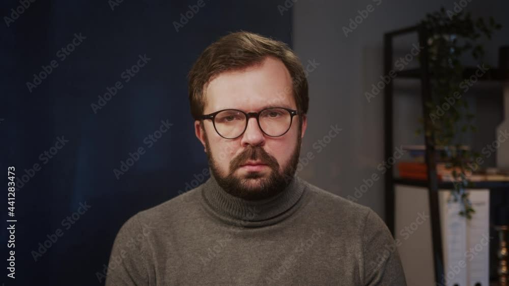 Serious male online teacher, professional psychologist, coach consulting student or business client via webcam chat video call. Remote office during coronavirus covid 19 lockdown, it engineer at home Serious male online teacher, professional psychologist, coach consulting student or business client via webcam chat video call. Remote office during coronavirus covid 19 lockdown, it engineer at home