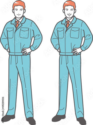腰に手をあてる作業服の男性（全身）