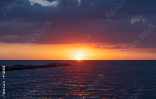 Fototapeta Naklejka Na Ścianę i Meble -  Sunset on a deserted beach 