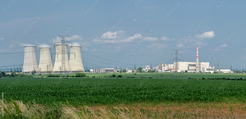 Cooling towers of nuclear power plant Jaslovske Bohunice , Slovakia with cloudy sky in the background. Nuclear power station.