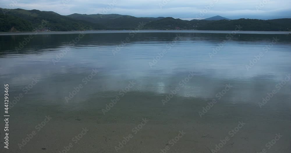 natural background summer sea in a bay with fluctuating water natural background summer sea in a bay with fluctuating water