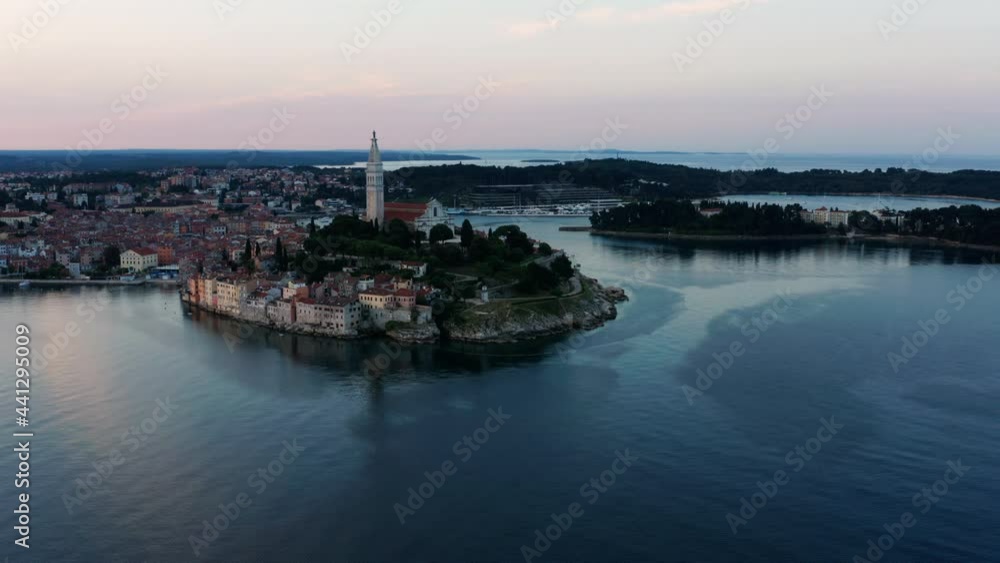 Croatian Town In Adriatic Sea At Rovinj On The Western Coast Of Istrian Peninsula. - Aerial Shot Croatian Town In Adriatic Sea At Rovinj On The Western Coast Of Istrian Peninsula. - Aerial Shot