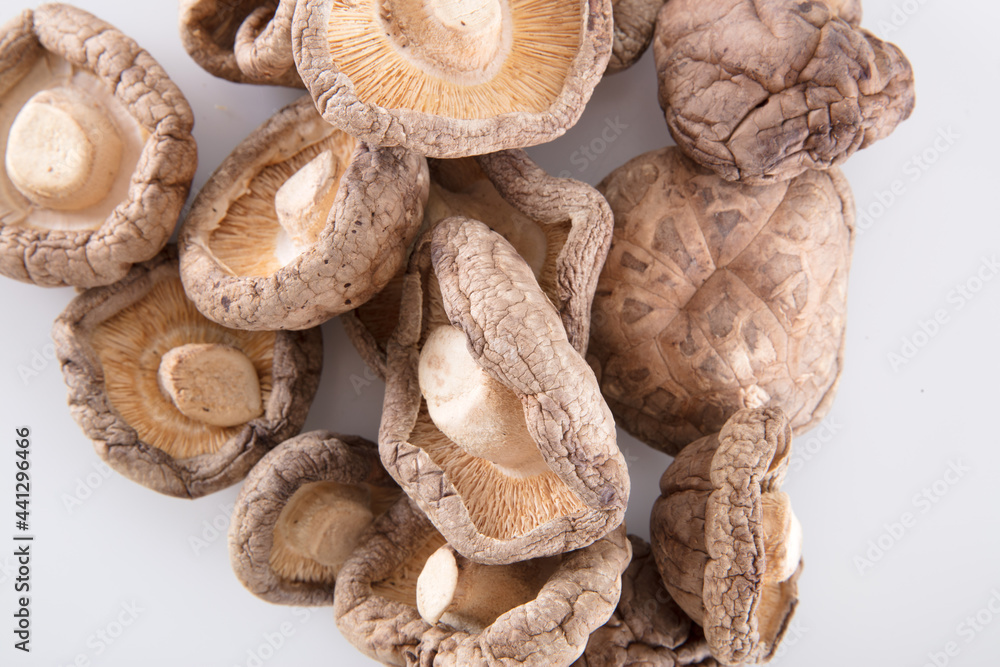 Dried shiitake mushrooms on white background Dried shiitake mushrooms on white background