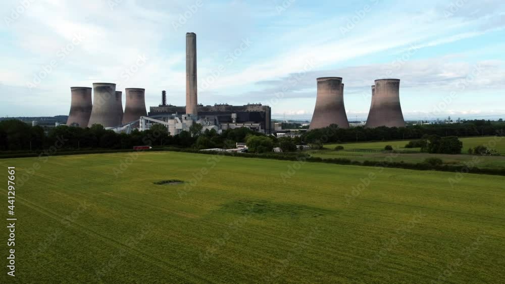 Fiddlers ferry power station aerial view cooling towers across agricultural farmland crops low dolly right Fiddlers ferry power station aerial view cooling towers across agricultural farmland crops low dolly right