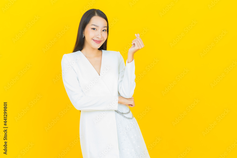 Portrait beautiful young asian woman smile with action Portrait beautiful young asian woman smile with action