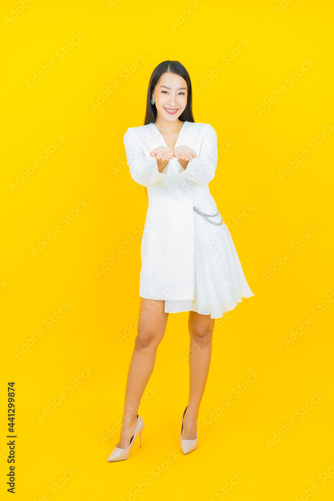 Portrait beautiful young asian woman smile with action Portrait beautiful young asian woman smile with action