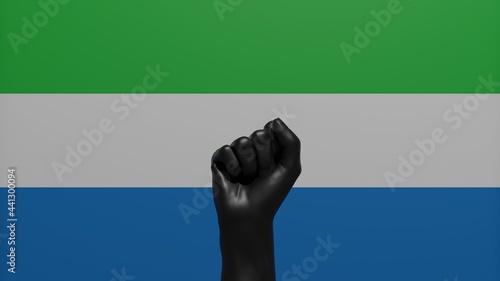 Foto A single raised Black Fist in the center in front of the Country Flag of Sierra