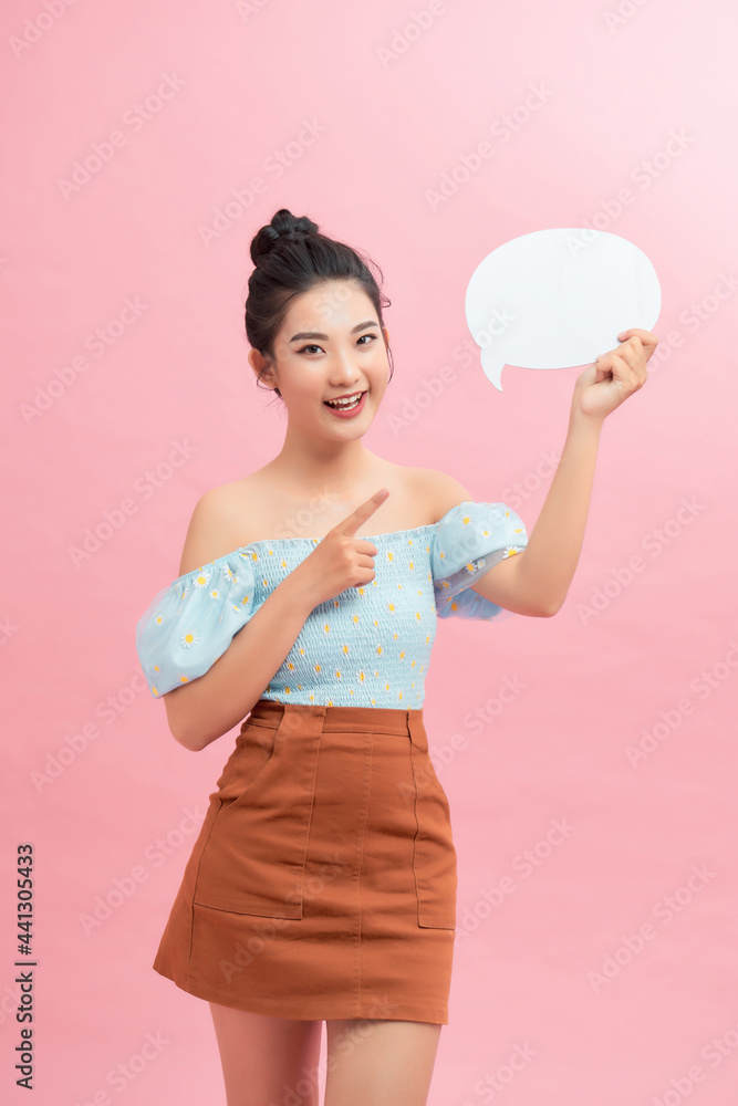cute woman screaming in blank speech bubble isolated on pink background cute woman screaming in blank speech bubble isolated on pink background