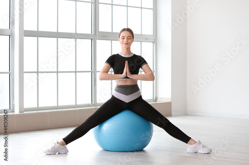 Sporty young woman with fit...