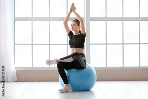 Sporty young woman with fit...