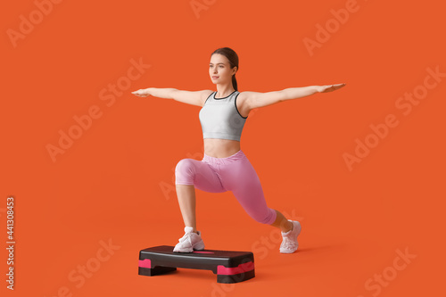 Sporty young woman training...