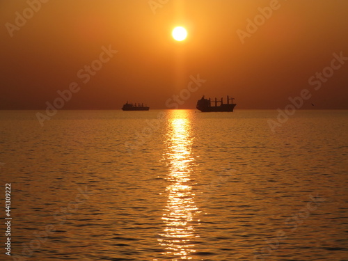 sunset and ship © Azim
