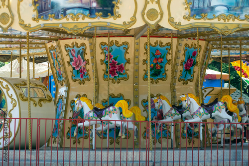 Children's carousel with horses