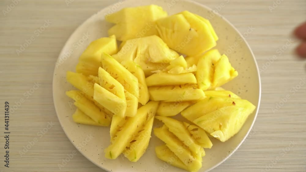 fresh pineapple sliced on plate fresh pineapple sliced on plate