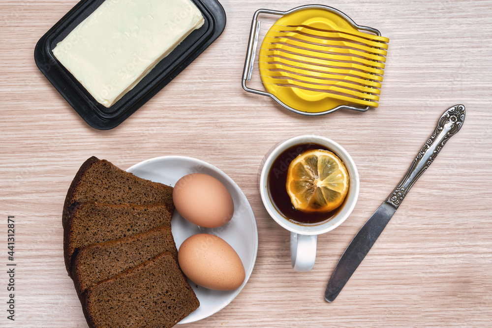 Making a breakfast sandwich, bread and butter and egg with egg cutting Making a breakfast sandwich, bread and butter and egg with egg cutting