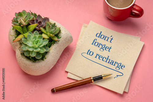 do not forget to recharge inspirational note on a napkin, work, healthy lifestyle and self care concept photo