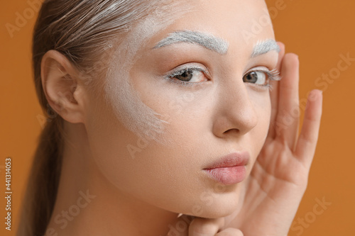 Beautiful young woman with ...