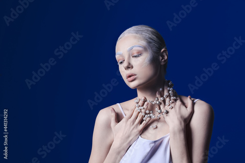 Beautiful young woman with ...