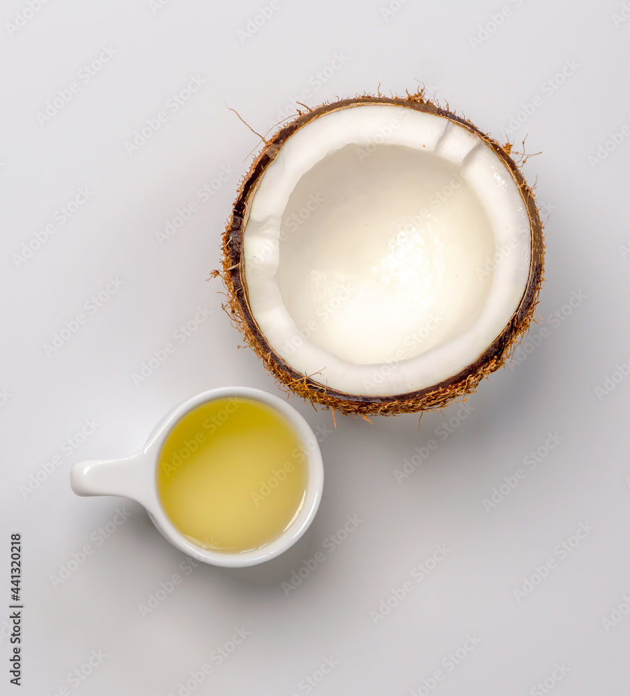 Coconut oil with a half of a coconut