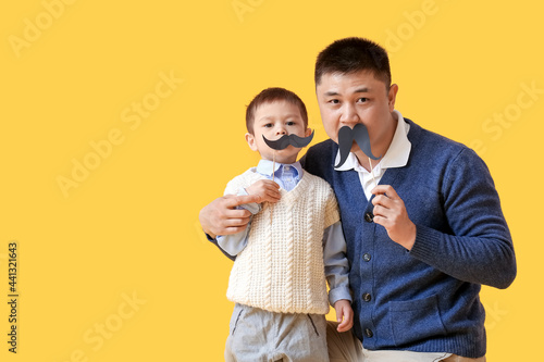 Happy father and his little...