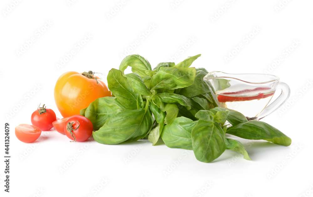Fresh basil leaves and products on white background Fresh basil leaves and products on white background