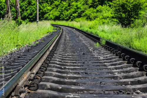 railway tracks on which trains run on a summer day. travel and transportation