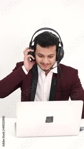 Indian businessman working at desk in office