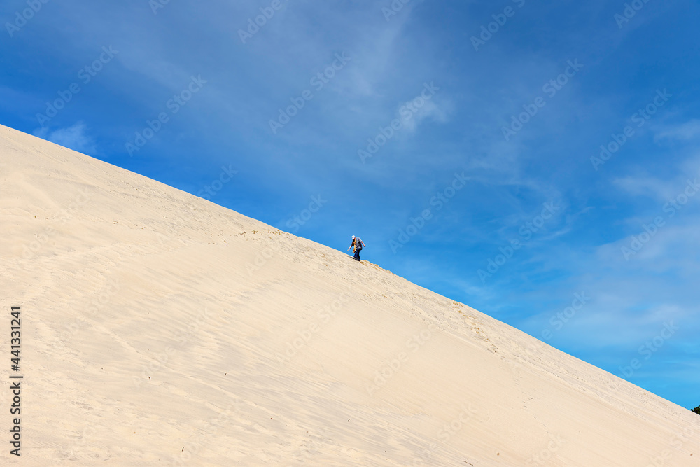 The snow-white dune of Pila, or Pilat (la Dune du Pyla, Pilat), on the territory of the commune of La Test-de-Buch near the Bay of Arcachon. France The snow-white dune of Pila, or Pilat (la Dune du Pyla, Pilat), on the territory of the commune of La Test-de-Buch near the Bay of Arcachon. France