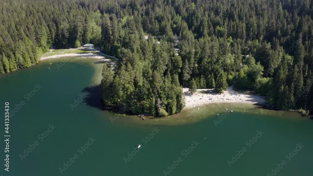 Beautiful Aerial shot over Lake Belcarra Regional Park - white sandy beach Beautiful Aerial shot over Lake Belcarra Regional Park - white sandy beach