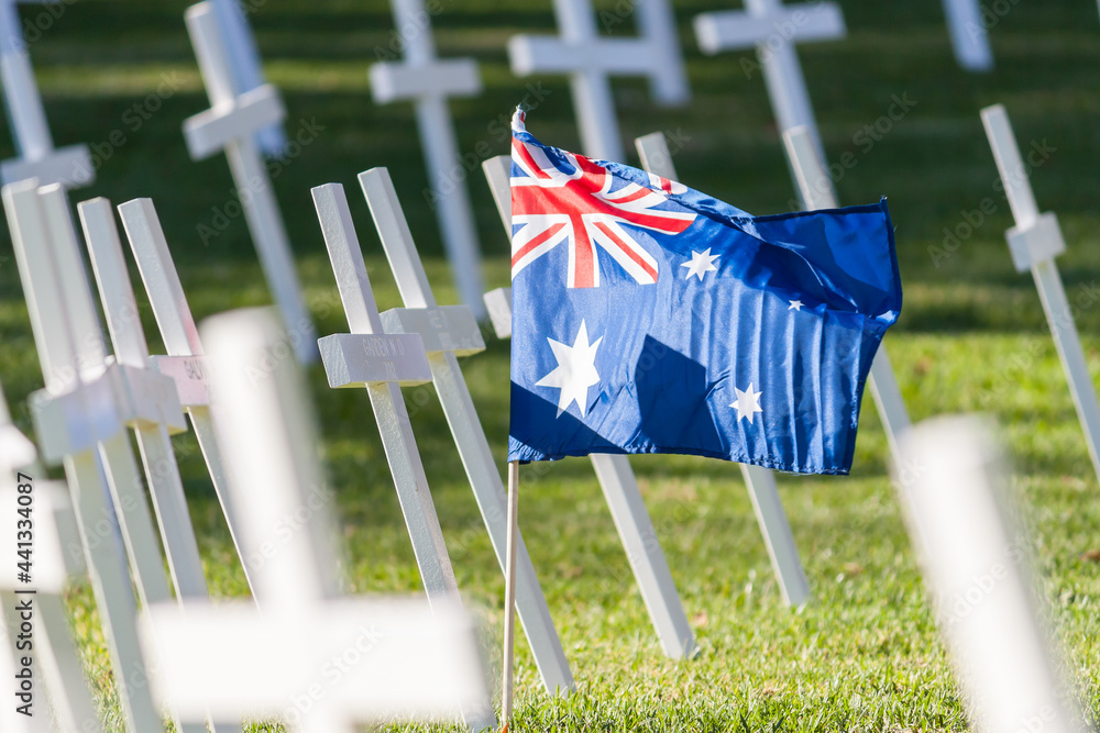 An Australian flag amongst a group of crosses