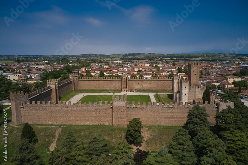 Aerial view of the Italian historic castle Castello Scaligero, view of the Villafranca di Verona. Historical part of the city Villafranca di Verona, Verona, Italy.