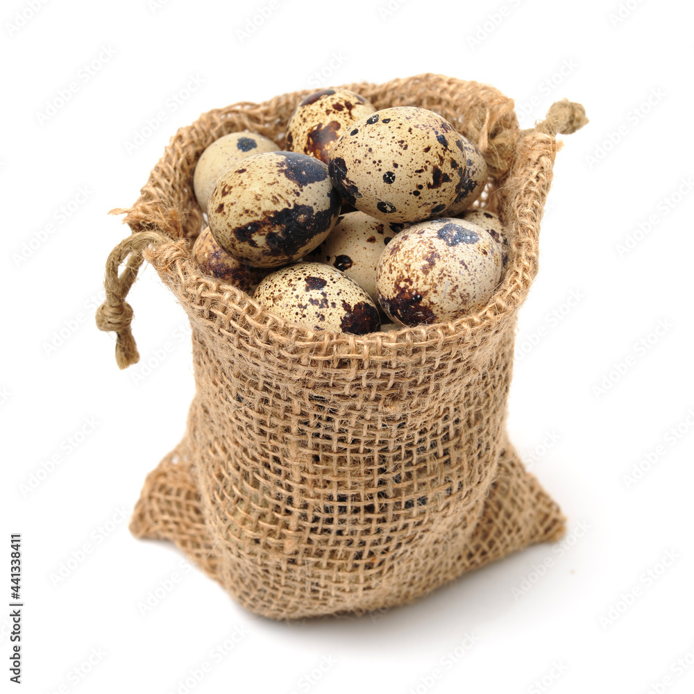 Obraz premium quail eggs on white background 