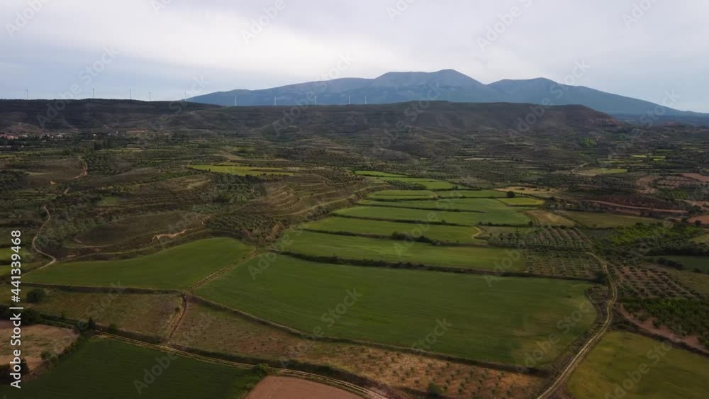 Drone view of a mountain with windfarm turbines Drone view of a mountain with windfarm turbines