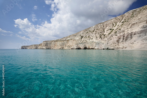 View from the sea of the tip of Tsigrado on the southern coast of the Greek island of Milos in the Cyclades photo