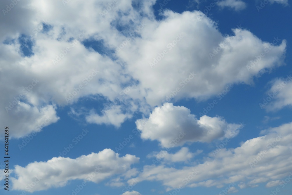 Beautiful fluffy clouds view in blue sky, natural background Beautiful fluffy clouds view in blue sky, natural background