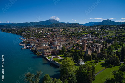 Top view of the historic part of the city Lazise Castle on the coastline of Lake Garda. Lazise Lake Garda Italy. Panorama of the historic town of Lazise. Aerial view of the Scaliger Castle of Lazise
