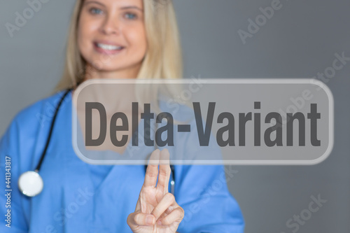 Delta Variant Sign - Female doctor touching screen