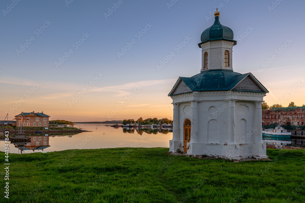 View of the chapel of the Holy Prince Alexander Nevsky near the Solovetsky Monastery against the background of the dawn cloudless sky, Solovetsky Island, Arkhangelsk region, Russia
