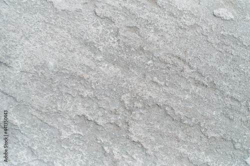 Pattern of Seamless rock texture and surface background close up. Rough split face stone texture.