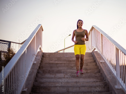 Fototapeta Naklejka Na Ścianę i Meble -  Fitness women exercising outdoors.