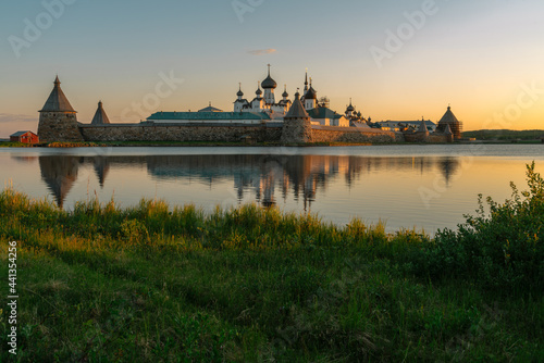 View of the Solovetsky Monastery from the side of the Holy Lake on a sunny cloudless morning, Solovetsky Island, Arkhangelsk region, Russia
