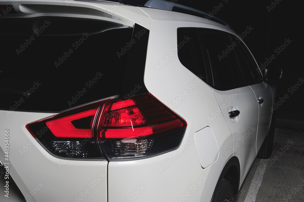 Fototapeta premium Back of white suv car