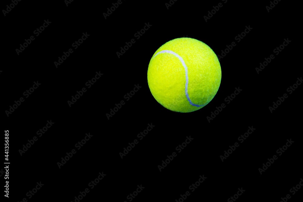 tennis ball isolated on black