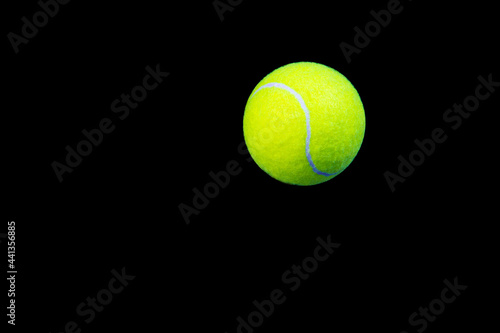 tennis ball isolated on black © Denis Shmunk