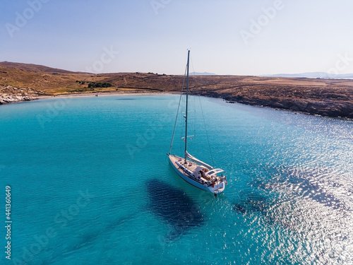 Blue water in the bay on the southwest coast of the Greek island of Rinia in the Cyclades