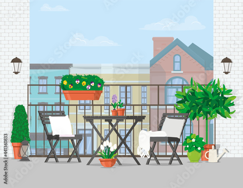 Balcony with garden furniture, plants and city views.